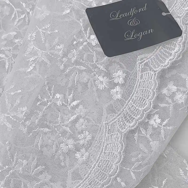 Pizzo tulle floreale bianco - Acquista subito